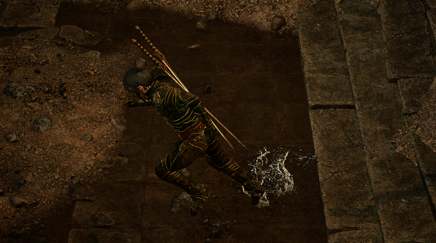 Configured surface contact effect with a splash beside a character on stone terrain.
